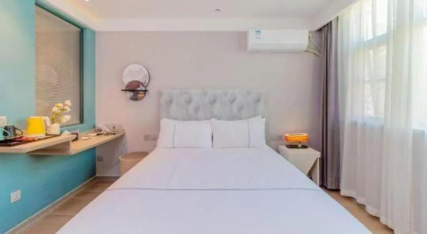 Bed in Magnotel Hotel Huizhou South Station Branch