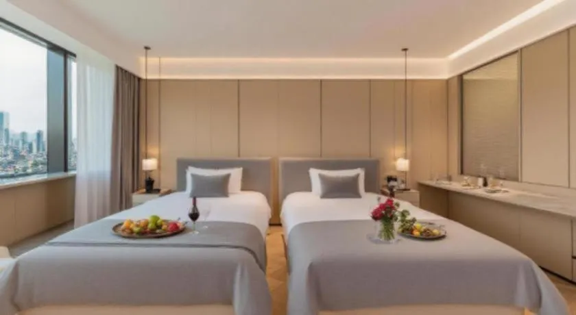 Bed in Magnotel Hotel Huizhou South Station Branch