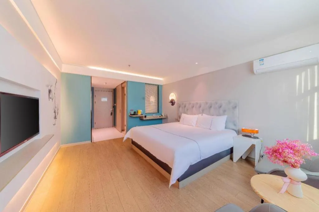 Bed in Magnotel Hotel Huizhou South Station Branch