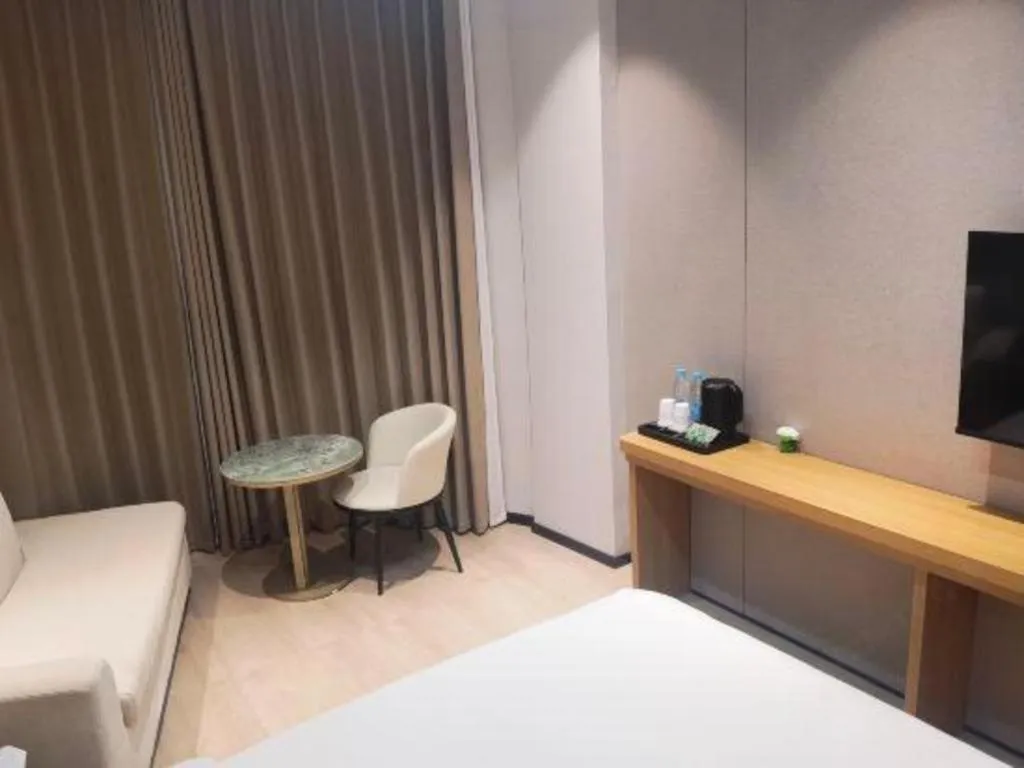 Bed in Magnotel Hotel Huizhou South Station Branch