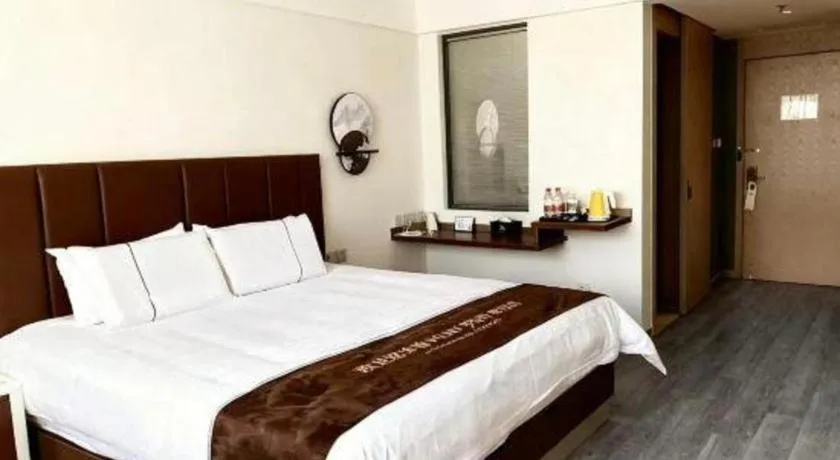 Bed in Magnotel Hotel Huizhou South Station Branch
