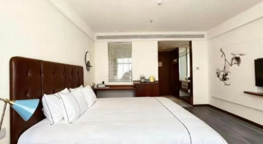 Bed in Magnotel Hotel Huizhou South Station Branch