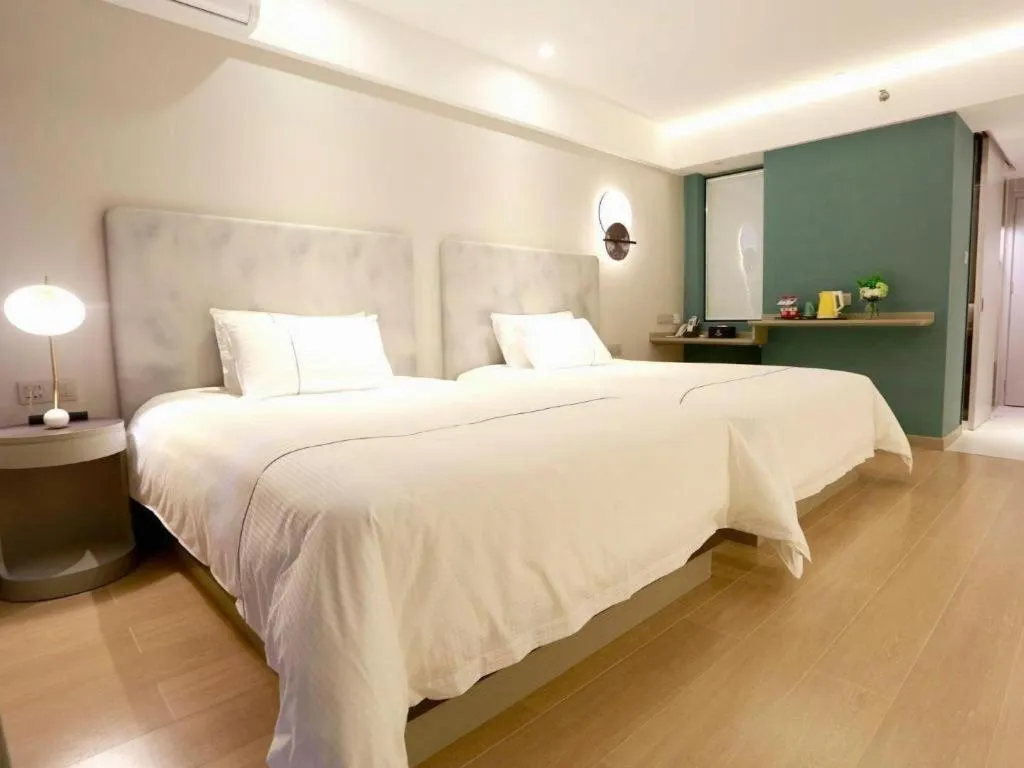 Bed in Magnotel Hotel Huizhou South Station Branch
