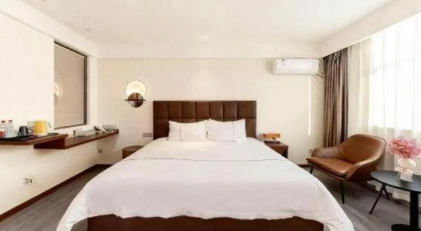 Bed in Magnotel Hotel Huizhou South Station Branch