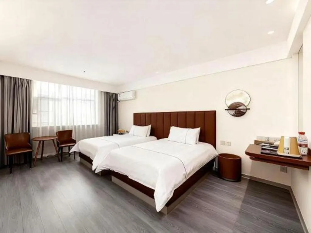 Bed in Magnotel Hotel Huizhou South Station Branch