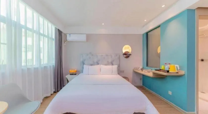 Bed in Magnotel Hotel Huizhou South Station Branch