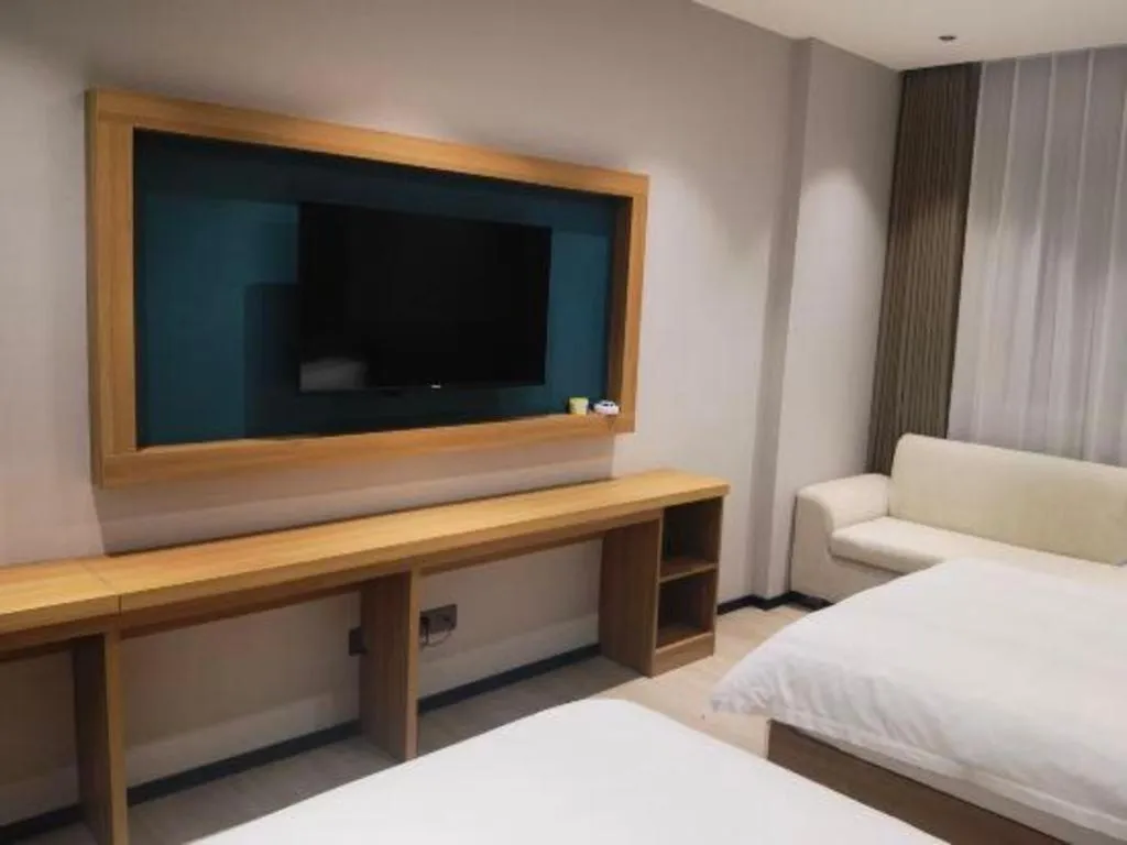 Bed in Magnotel Hotel Huizhou South Station Branch