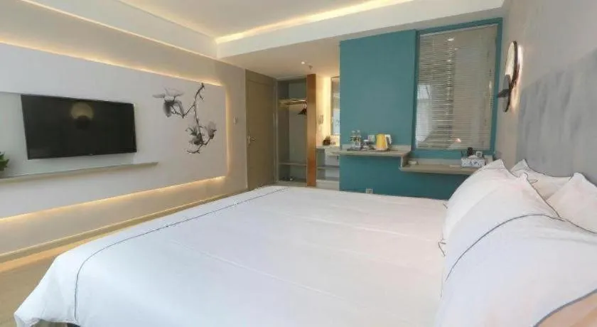 Bed in Magnotel Hotel Huizhou South Station Branch