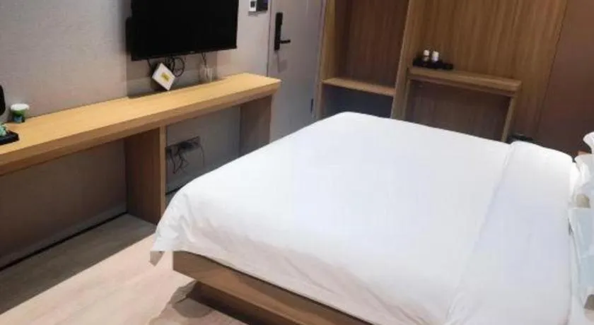 Bed in Magnotel Hotel Huizhou South Station Branch