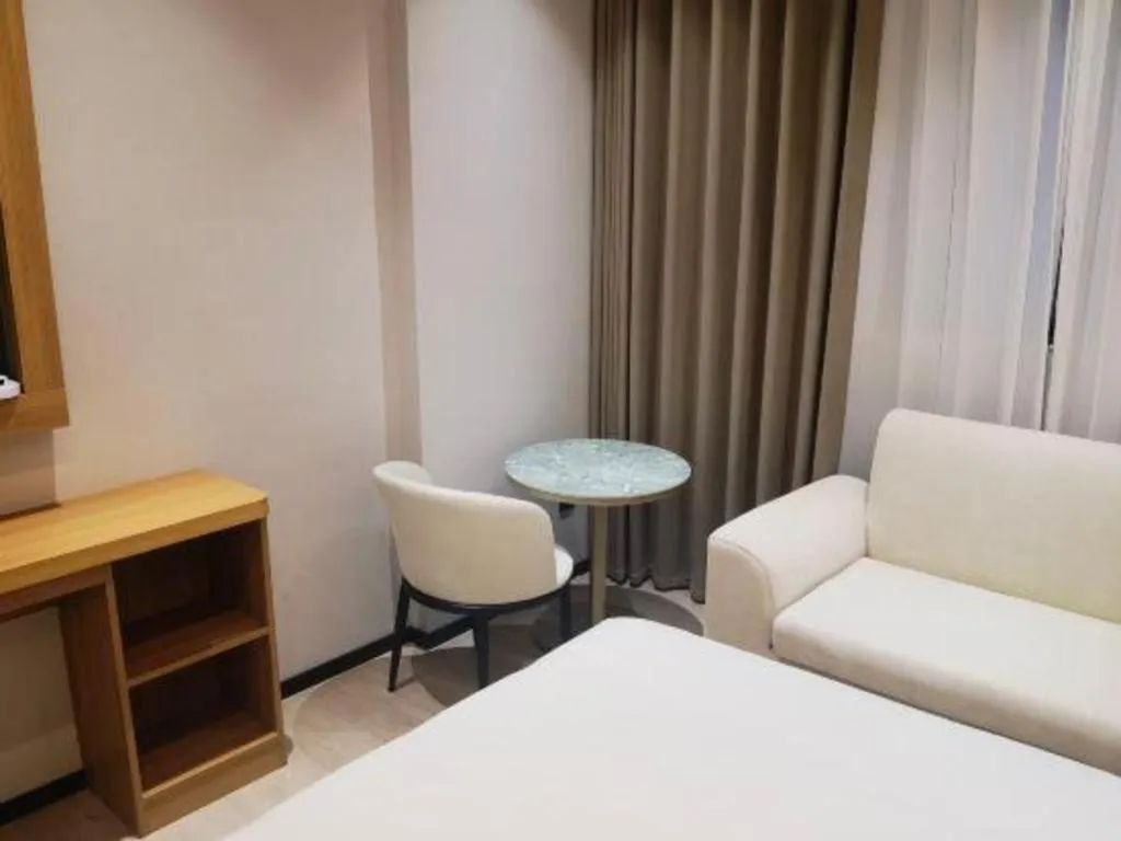 Bed in Magnotel Hotel Huizhou South Station Branch