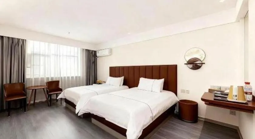 Bed in Magnotel Hotel Huizhou South Station Branch