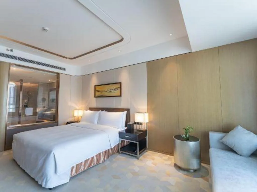 Bed in The QUBE Hotel Jingzhou