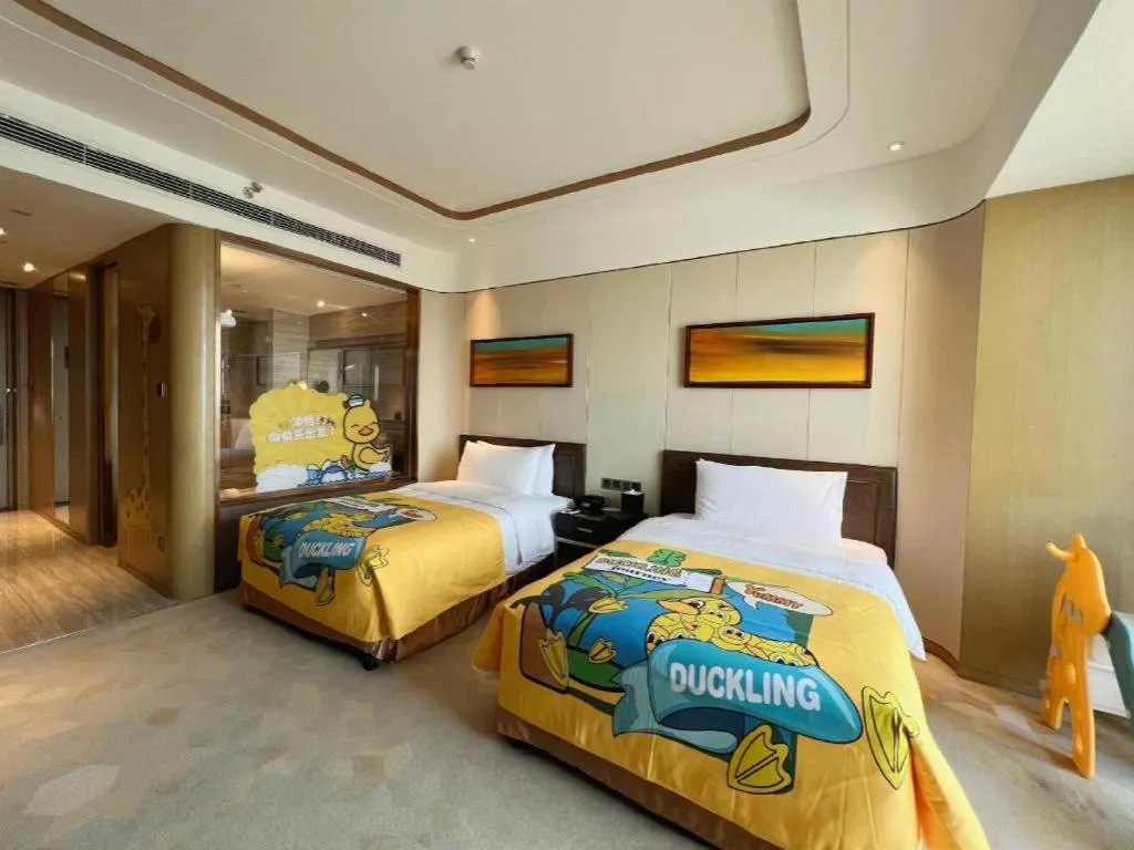 Bed in The QUBE Hotel Jingzhou