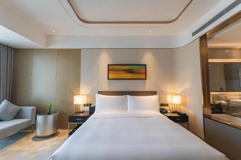 Bed in The QUBE Hotel Jingzhou