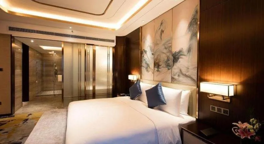 Bed in The QUBE Hotel Jingzhou