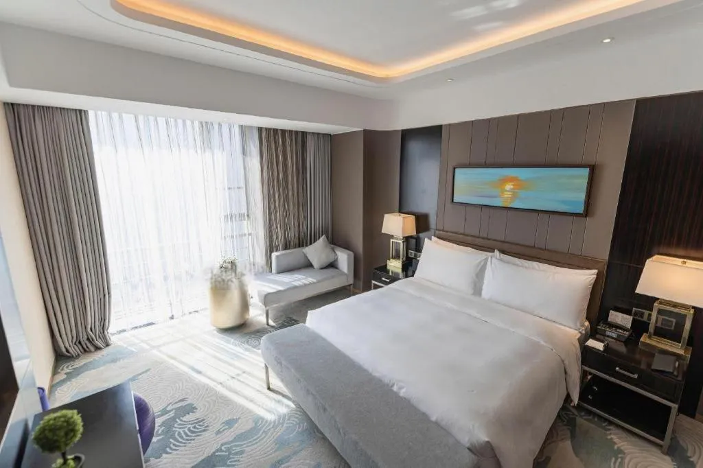 Bed in The QUBE Hotel Jingzhou
