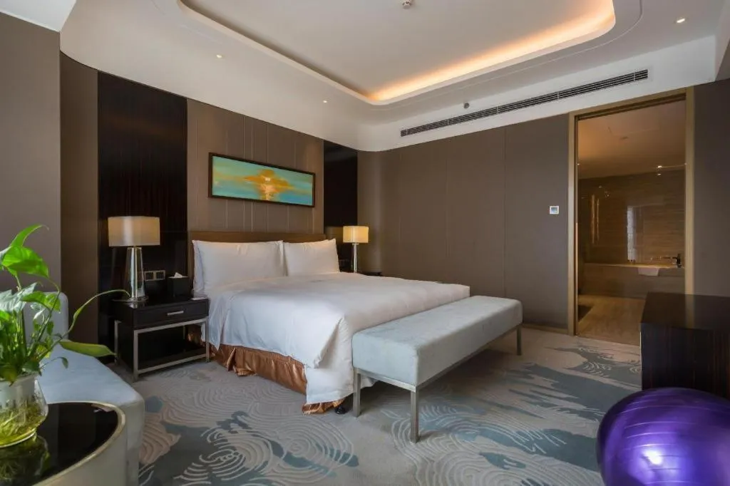 Bed in The QUBE Hotel Jingzhou