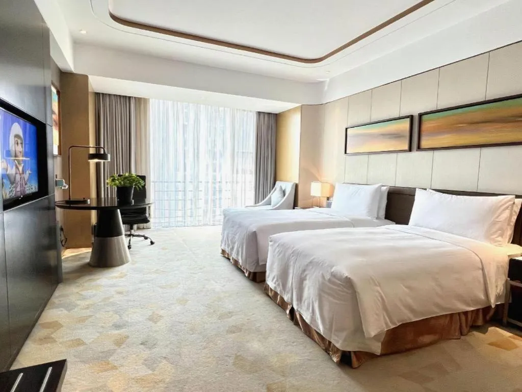Bed in The QUBE Hotel Jingzhou