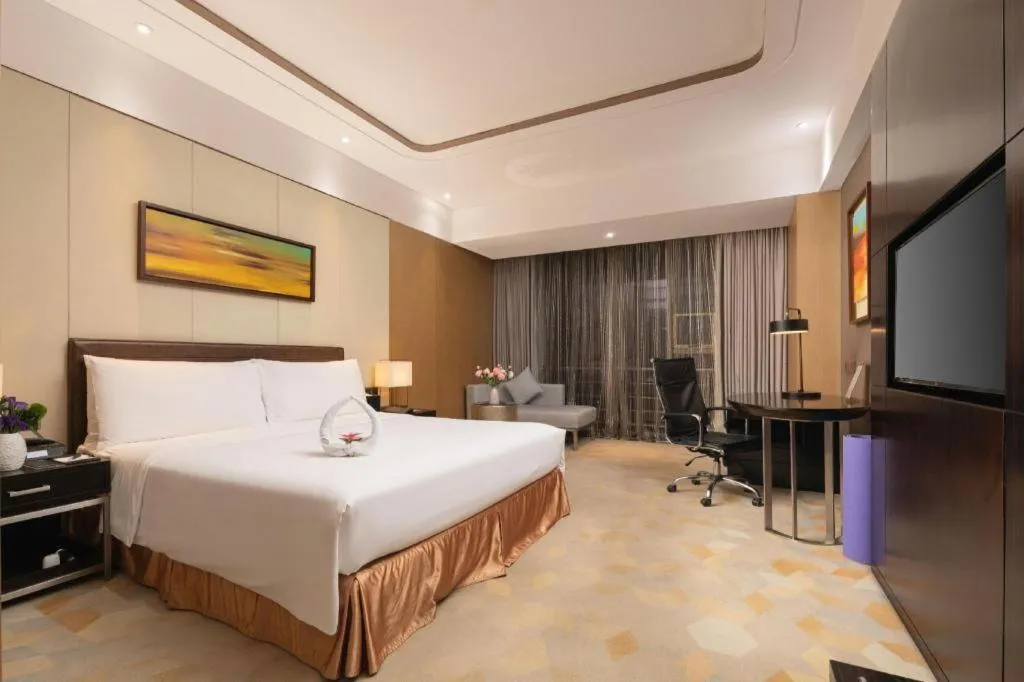 Bed in The QUBE Hotel Jingzhou