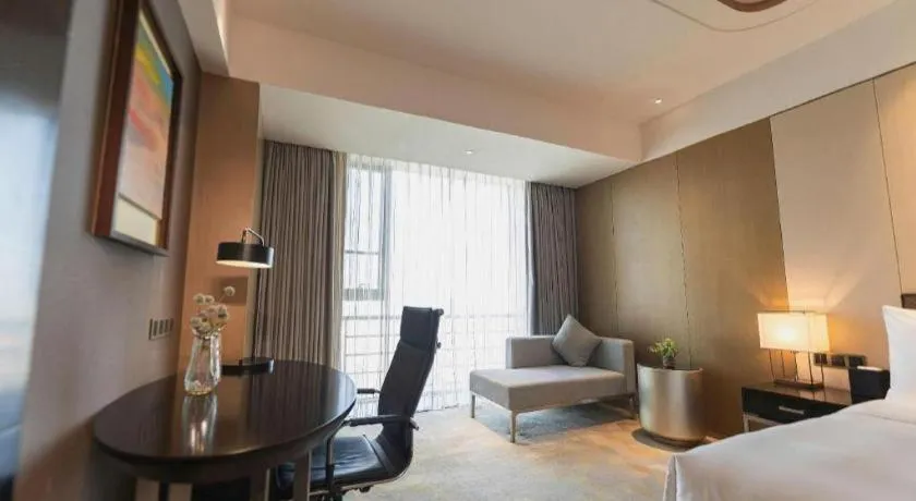 Bed in The QUBE Hotel Jingzhou