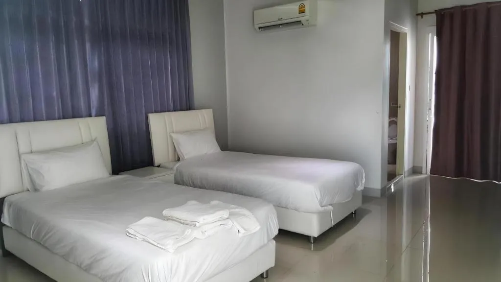 Bed in River Residence Saraburi Hotel