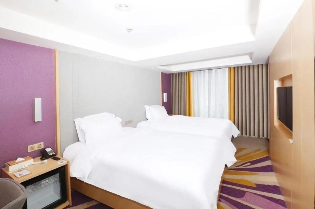 Bed in Lavande Hotels Guangzhou Baiyun Avenue North Metro Station