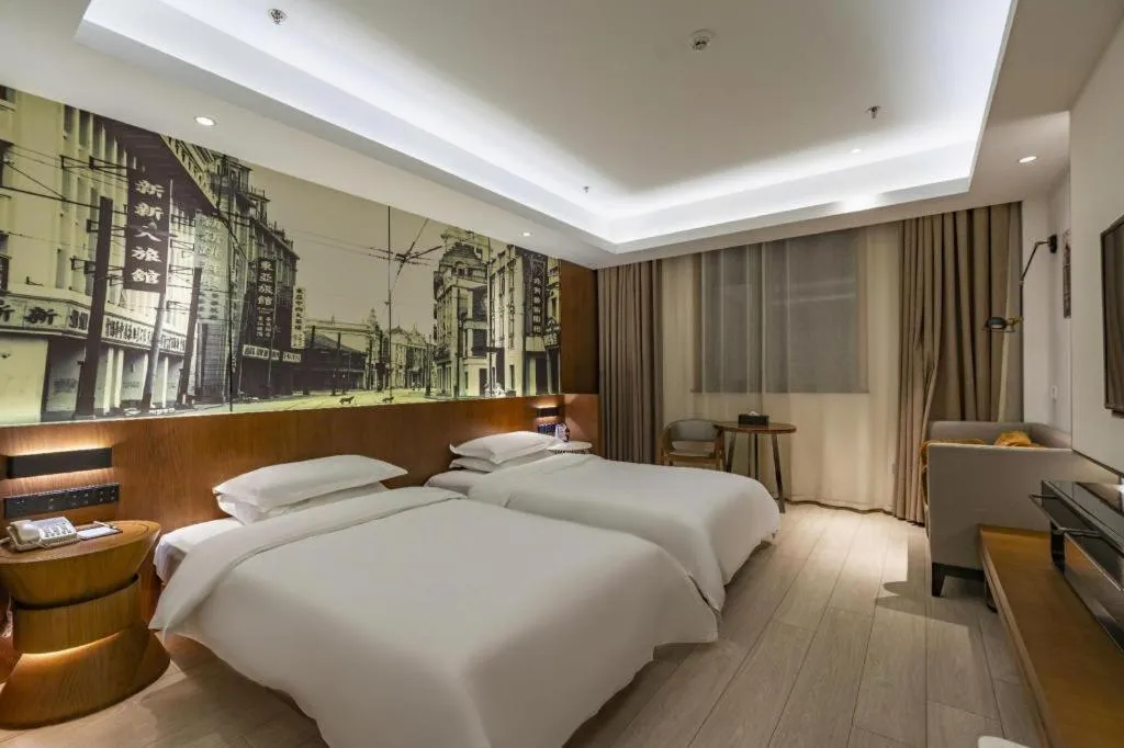 Bed in Jinjiang Metropolo Hotel Shanghai Hongqiao International Exhibition Center Branch