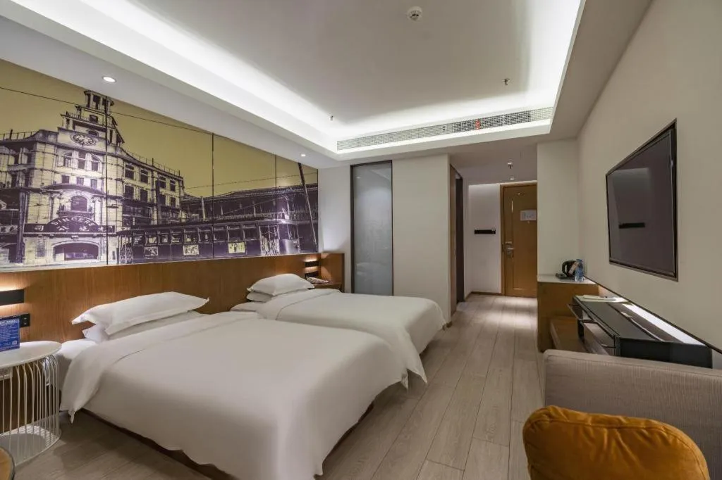 Bed in Jinjiang Metropolo Hotel Shanghai Hongqiao International Exhibition Center Branch