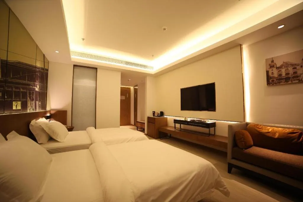 Bed in Jinjiang Metropolo Hotel Shanghai Hongqiao International Exhibition Center Branch