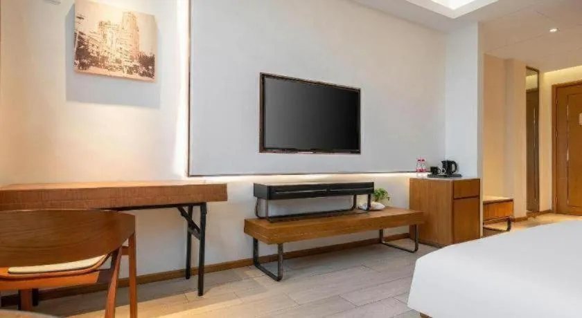 Bed in Jinjiang Metropolo Hotel Shanghai Hongqiao International Exhibition Center Branch