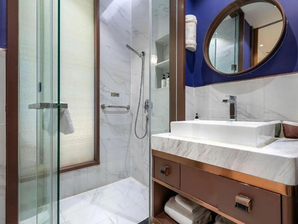 Bed in Jinjiang Metropolo Hotel Shanghai Hongqiao International Exhibition Center Branch