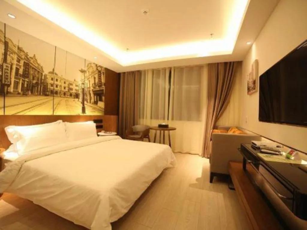 Bed in Jinjiang Metropolo Hotel Shanghai Hongqiao International Exhibition Center Branch