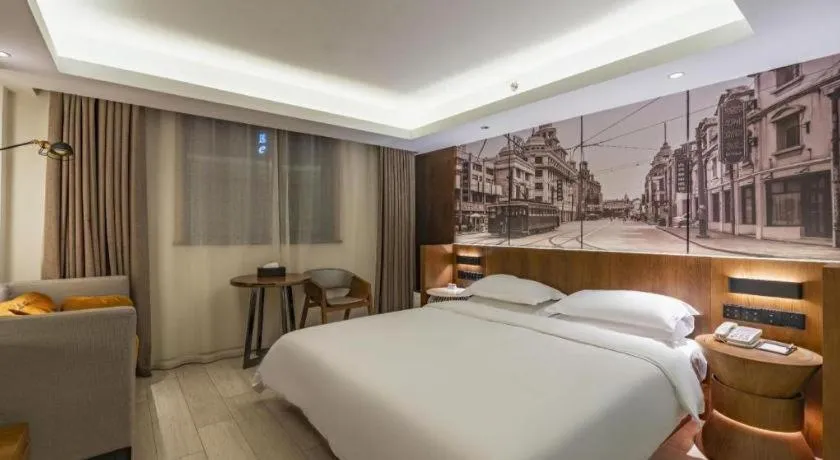 Bed in Jinjiang Metropolo Hotel Shanghai Hongqiao International Exhibition Center Branch