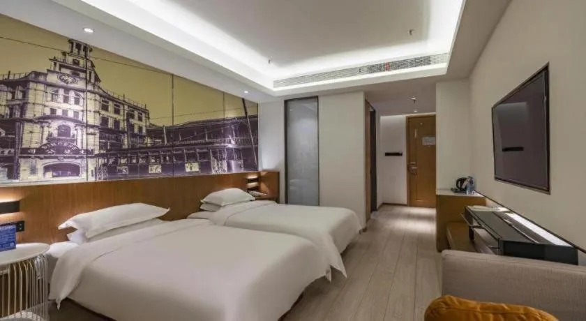 Bed in Jinjiang Metropolo Hotel Shanghai Hongqiao International Exhibition Center Branch