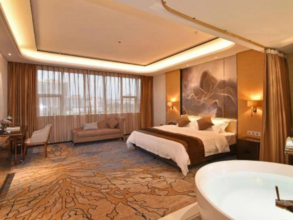 Bed in The Bmc Hotel