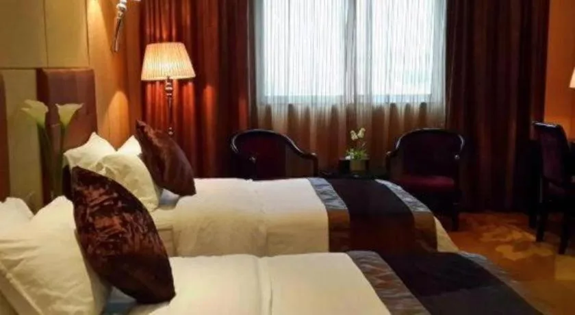 Bed in The Bmc Hotel