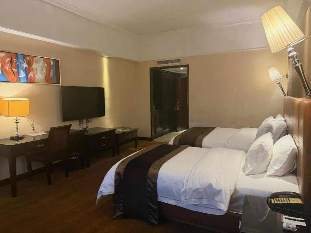 Bed in The Bmc Hotel