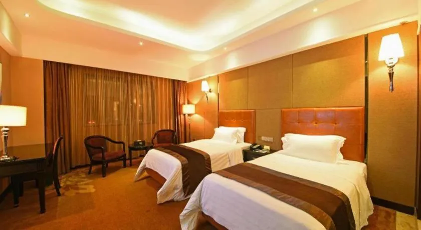 Bed in The Bmc Hotel