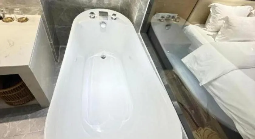 Bed in The Bmc Hotel