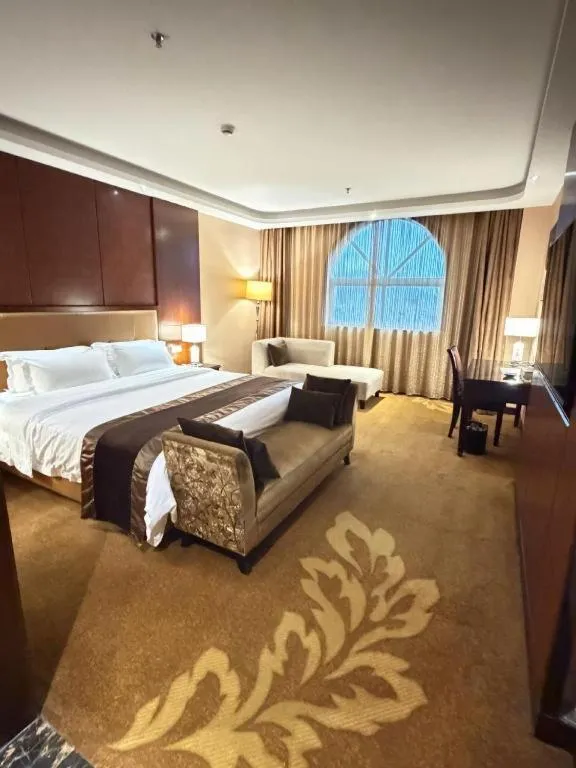 Bed in The Bmc Hotel