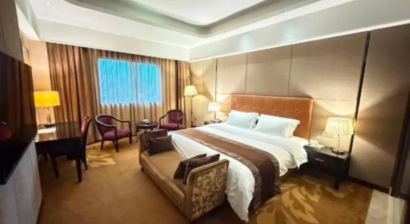 Bed in The Bmc Hotel