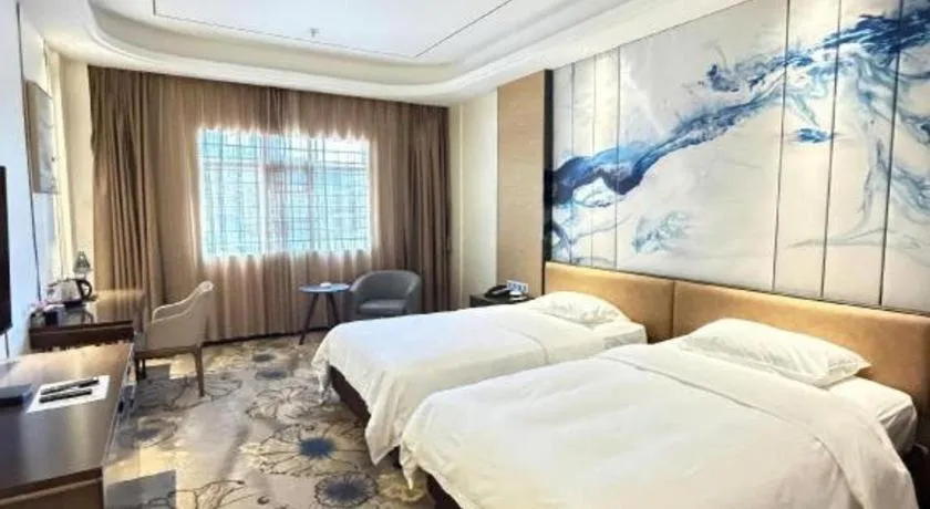 Bed in The Bmc Hotel