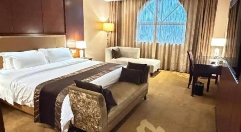 Bed in The Bmc Hotel