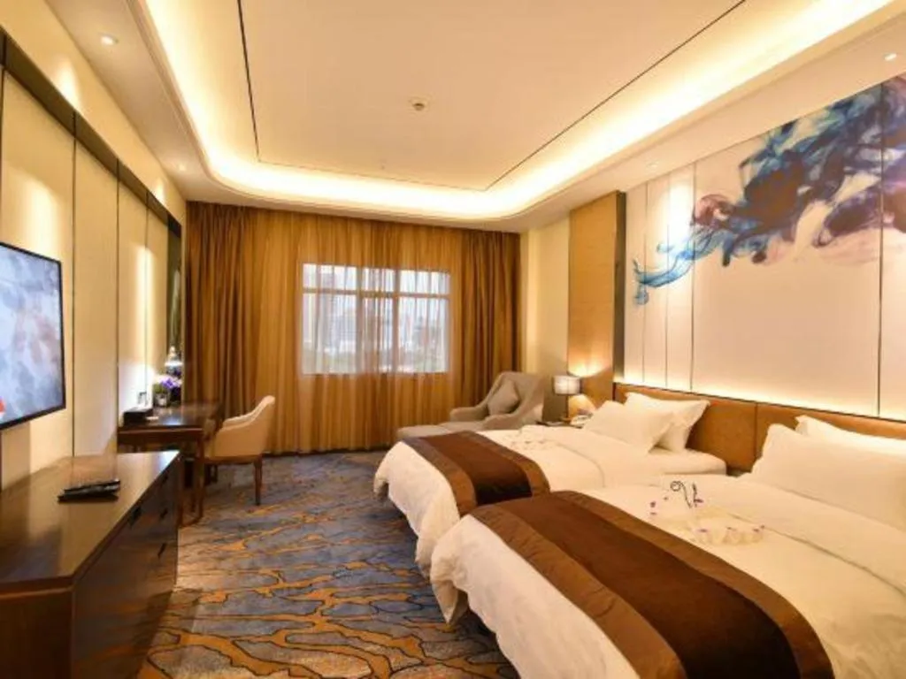 Bed in The Bmc Hotel