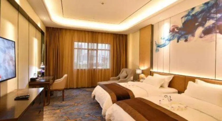 Bed in The Bmc Hotel