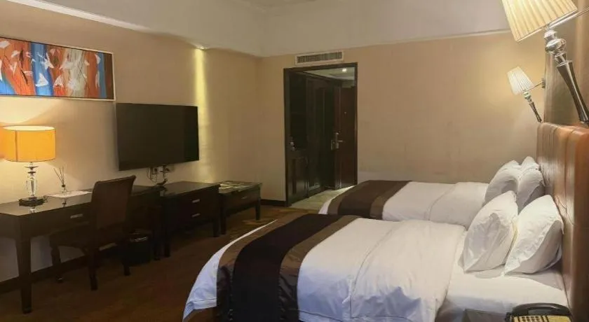 Bed in The Bmc Hotel