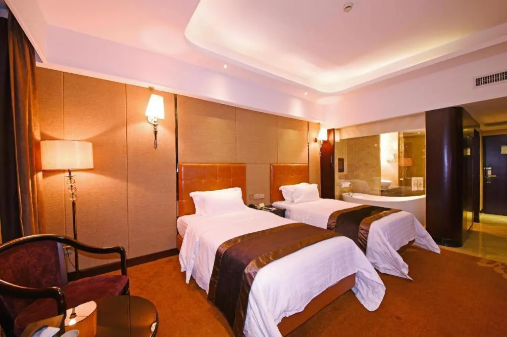 Bed in The Bmc Hotel