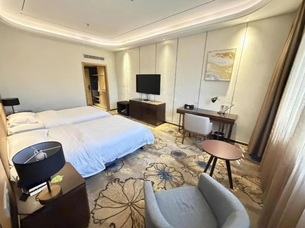 Bed in The Bmc Hotel