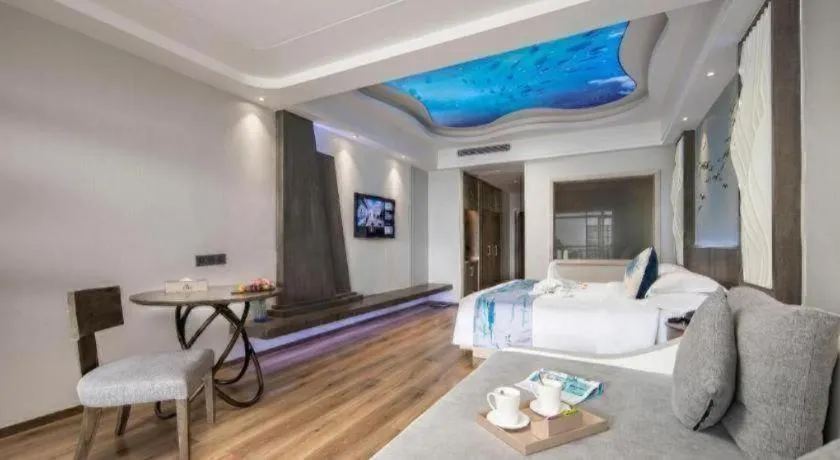 Bed in HuangMa holiday yacht view sea resort hotel