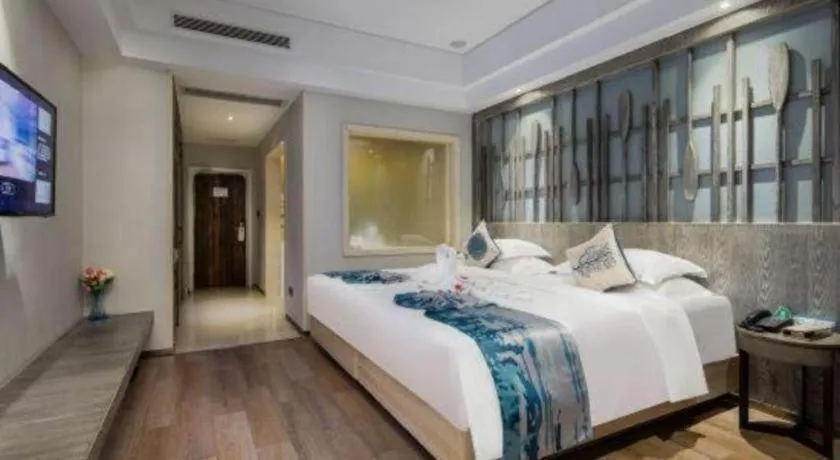 Bed in HuangMa holiday yacht view sea resort hotel